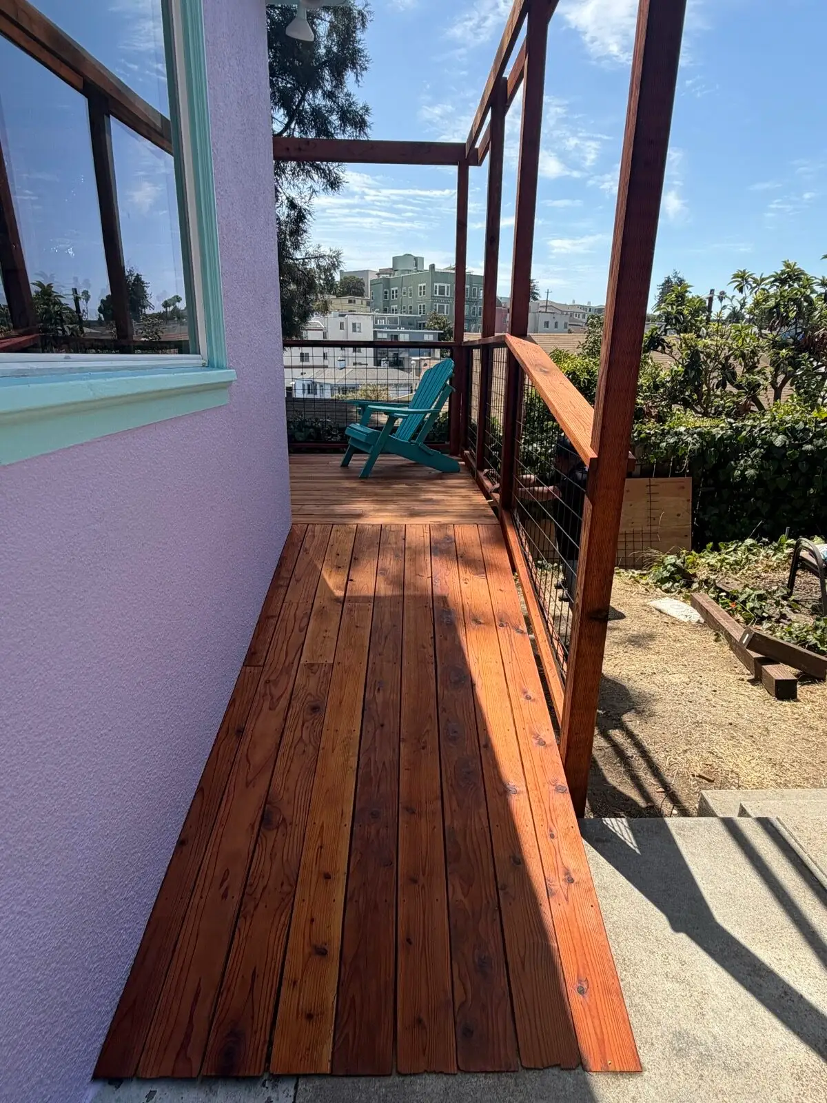 House painters in Downtown Oakland — deck staining project with city views by Wilmar's Painting
