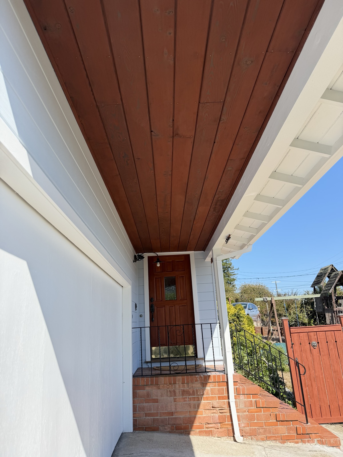 House painters in El Cerrito — stained wood porch ceiling and trim by Wilmar's Painting