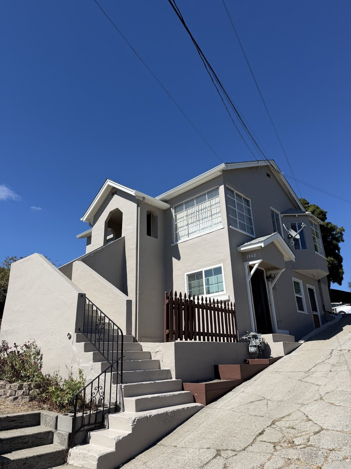 White modern multi-level home exterior painting